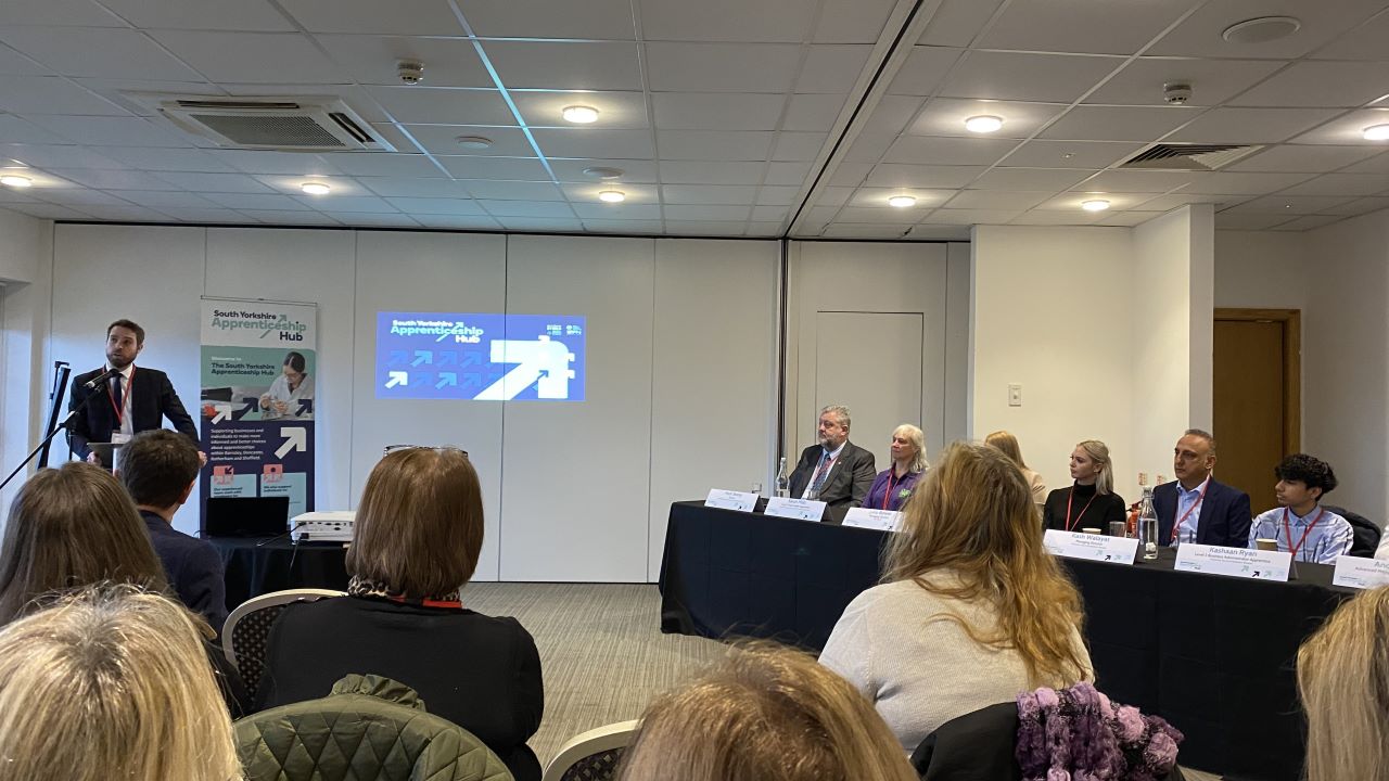 Jack Kidder from Henry Boot hosting the launch of the South Yorkshire Apprenticeship Hub, along with members of the audience and the employer/apprentice panel